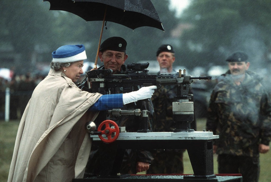 Mandatory Credit: Photo by REX Shutterstock (527161b) Queen Elizabeth II firing a rifle during a visit to the Army rifle association at Bisley, Britain Various